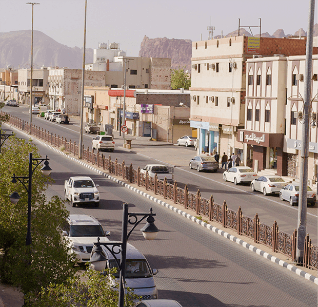 Vehicles on a street in AlUla